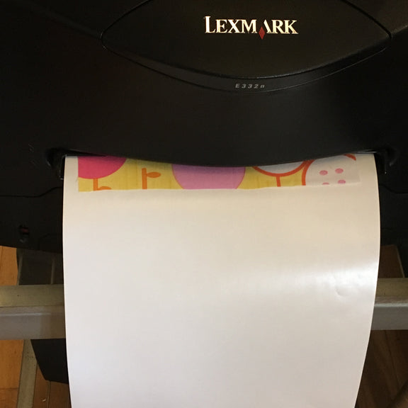 To print on Mistyfused fabric for guide lines for cutting or embroidery or for making custom labels: iron prefused fabric to Bunny Paper for a trip through your ink jet or laser desktop printer. 