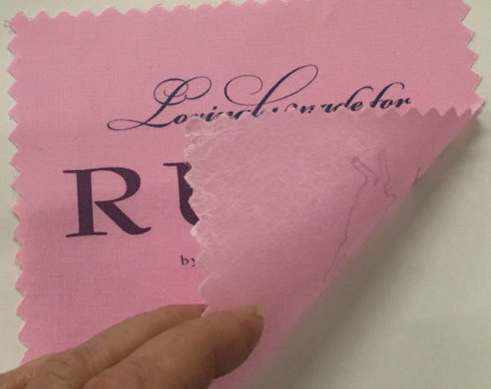 Print on Mistyfused fabric for guidelines for cutting or embroidery or for making custom labels: iron prefused fabric to Bunny Paper for a trip through your ink jet or laser desktop printer. 